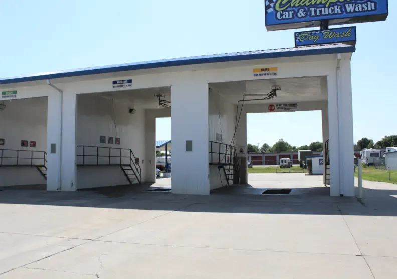 Truck bays at Champions Car and Truck Wash, designed to accommodate semis with taller height and catwalks on either side for easy cleaning