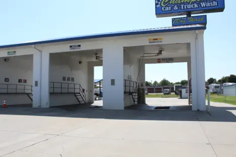 Truck bays at Champions Car and Truck Wash, designed to accommodate semis with taller height and catwalks on either side for easy cleaning